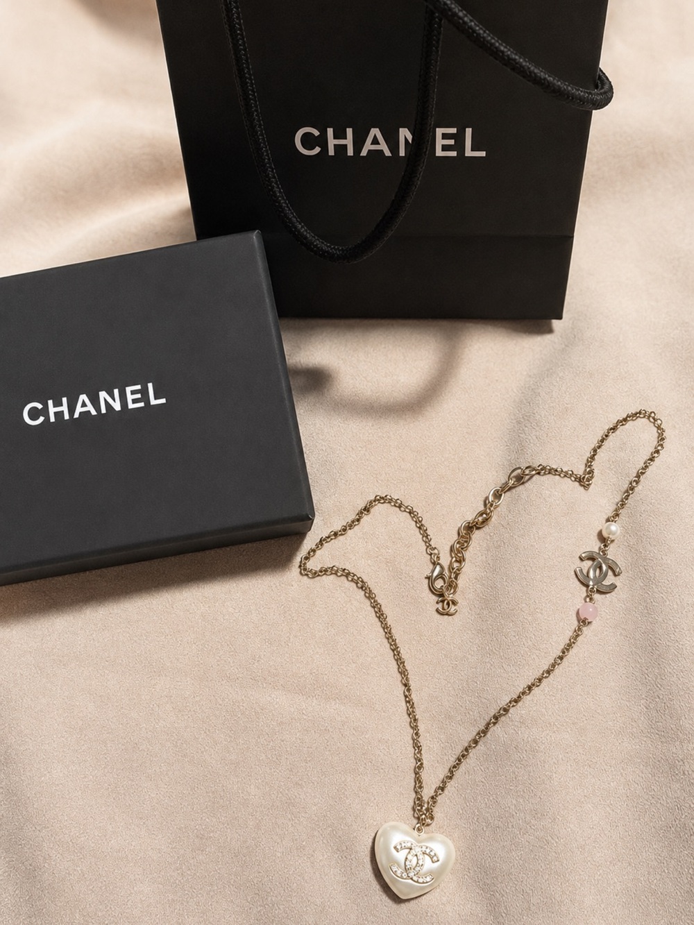 CHANEL Gold and White Heart Pendant Necklace with Pink Accent